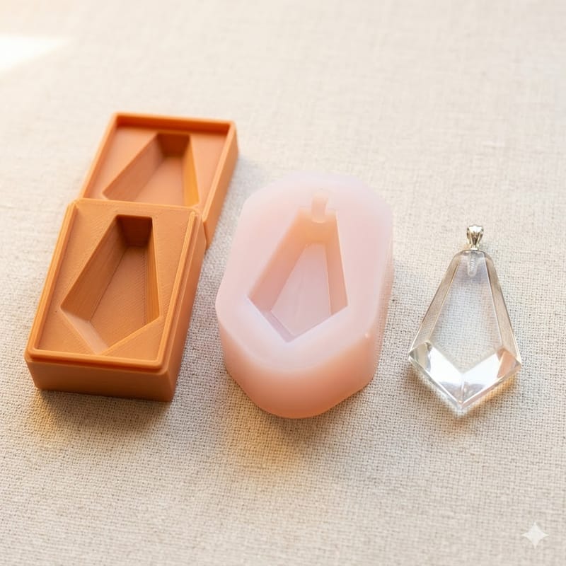 A silicone mold next to its 3D-printed master and outer shell