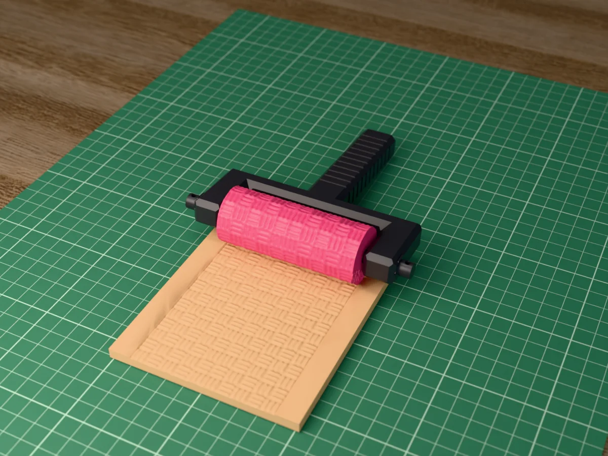 3D render of the printed basketweave texture roller in its dark fork handle, resting on a slab of clay it has pressed with basketweave