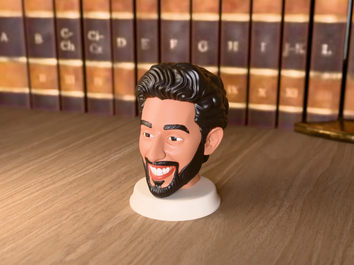 3D render of a 3D-printed bust of a guy with short black hair and a trimmed black beard, painted in 5 colours, on a table
