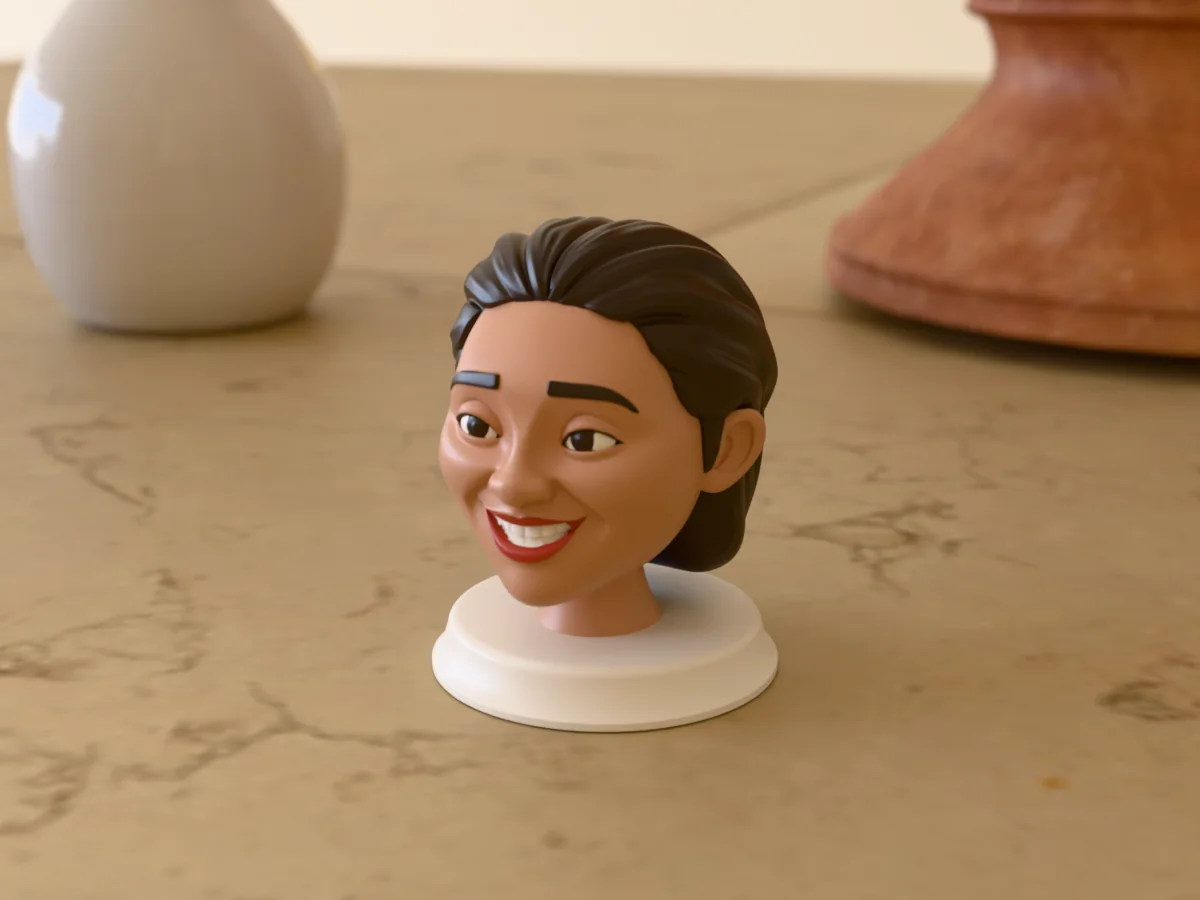 3D render of a 3D-printed bust of a smiling woman with a dark bob, painted in 6 colours, on a table