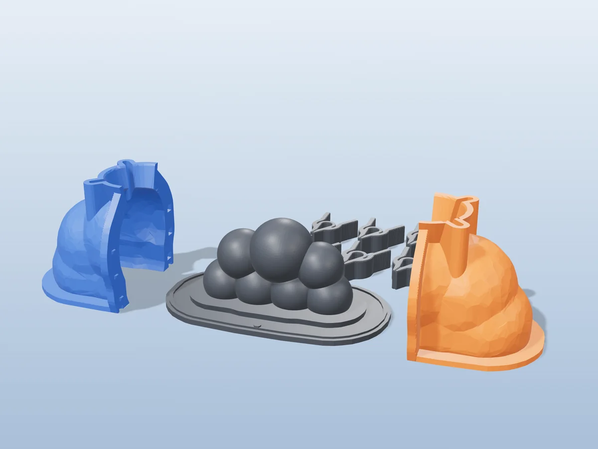 3D render of the bubble cloud master fused on its printed charcoal base, between the orange and blue hugging shell halves