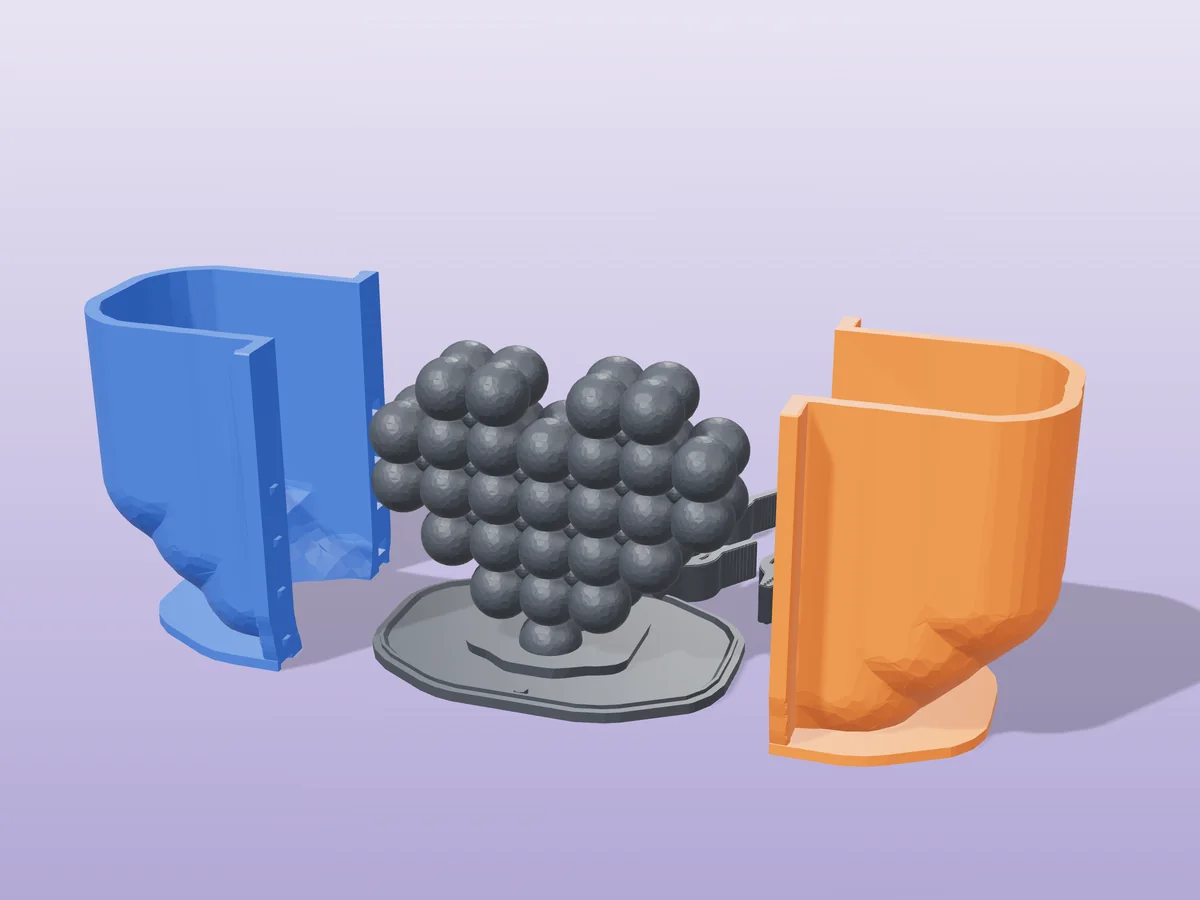 3D render of the bubble heart master fused on its printed charcoal base, between the orange and blue hugging shell halves