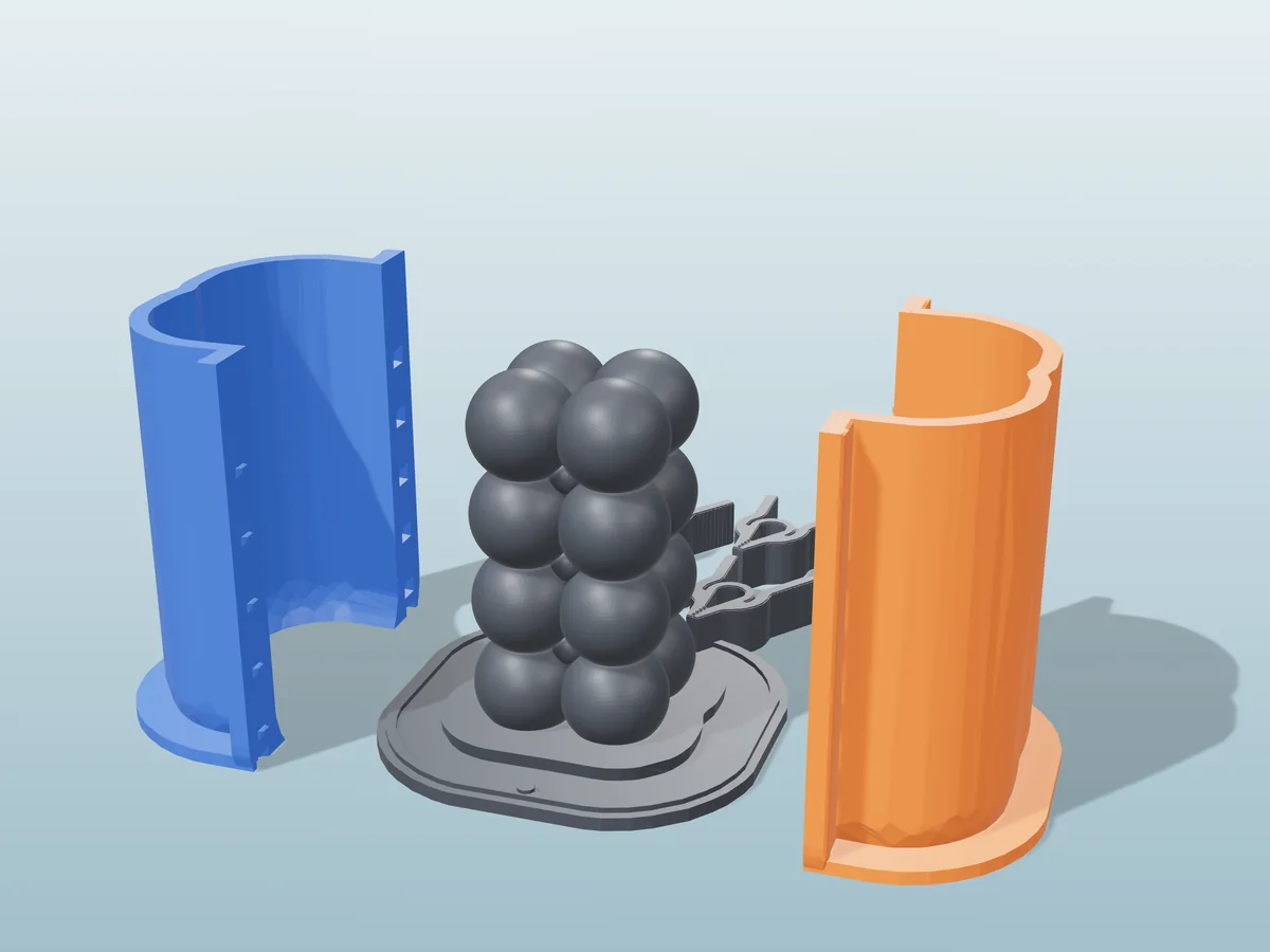 3D render of the bubble tower master fused on its printed charcoal base, between the orange and blue hugging shell halves