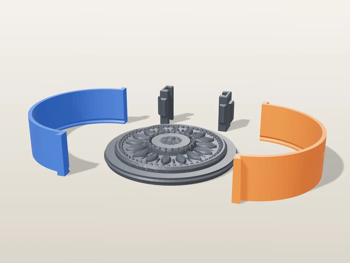 3D render of the round ceiling rosette master with its beaded rim and ring of leaves, fused on its printed charcoal base, between the orange and blue round walls