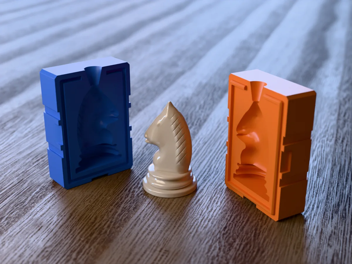 3D render of an ivory resin chess knight with a carved mane between the two printed halves of its rigid orange and blue mold