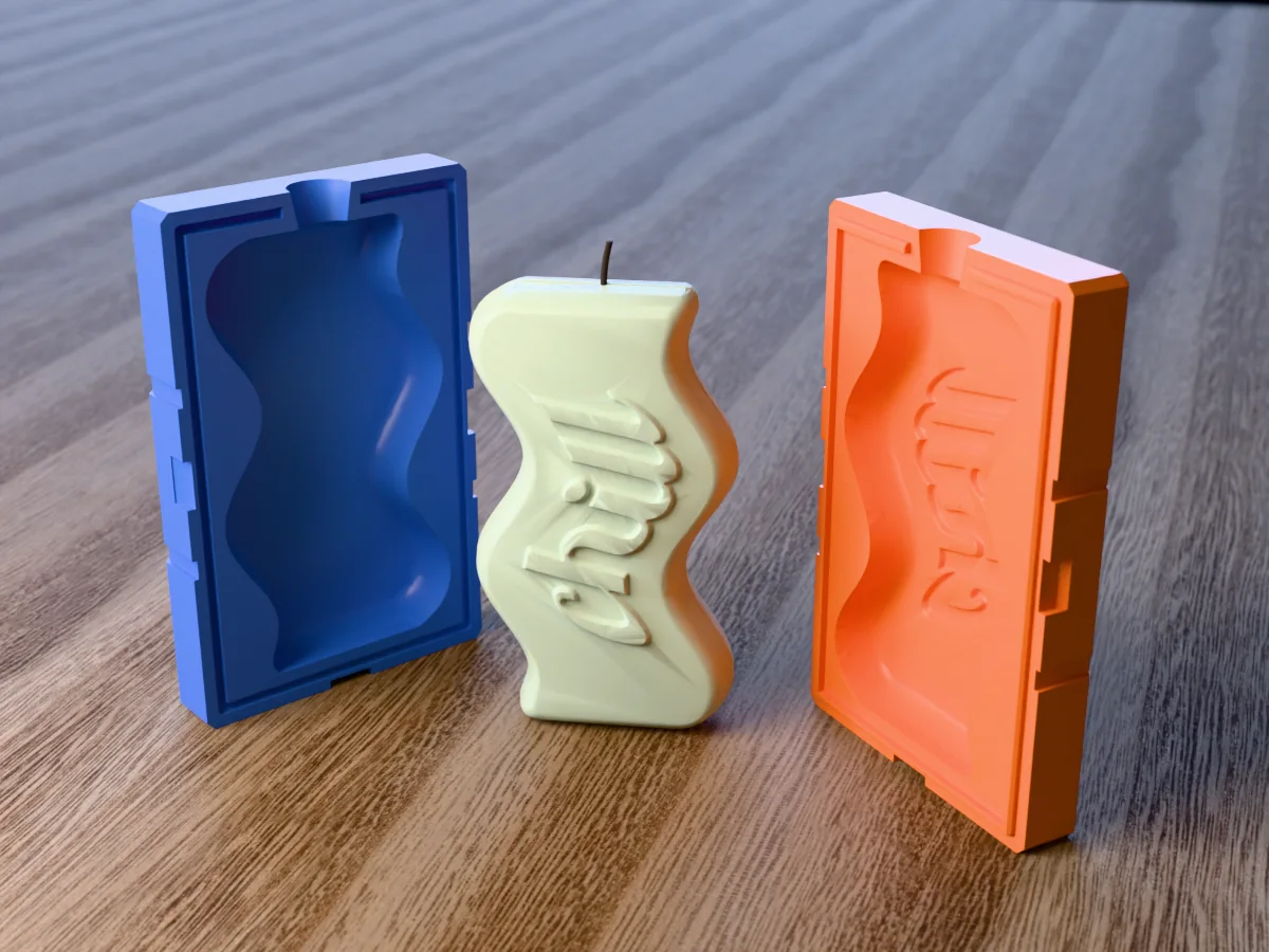 3D render of a wavy slab candle with "chill" in raised script between the two printed halves of its rigid orange and blue mold