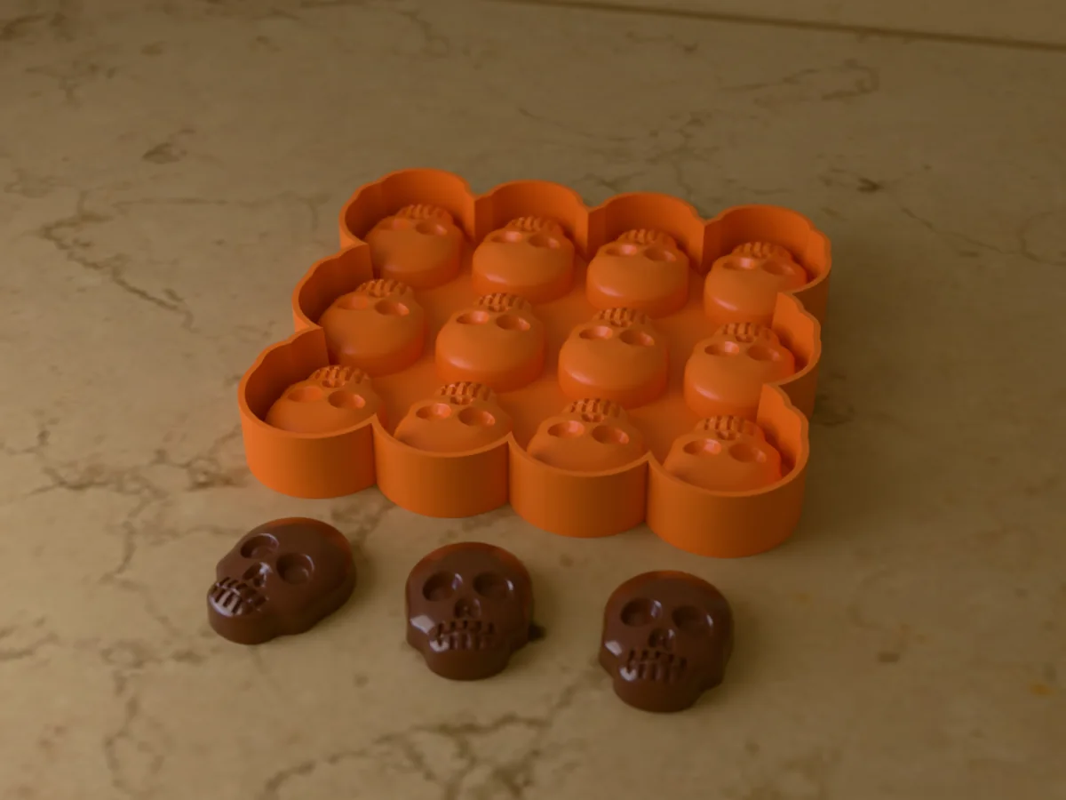 3D render of the printed caster for a twelve-skull silicone chocolate tray, with three chocolate skulls in front