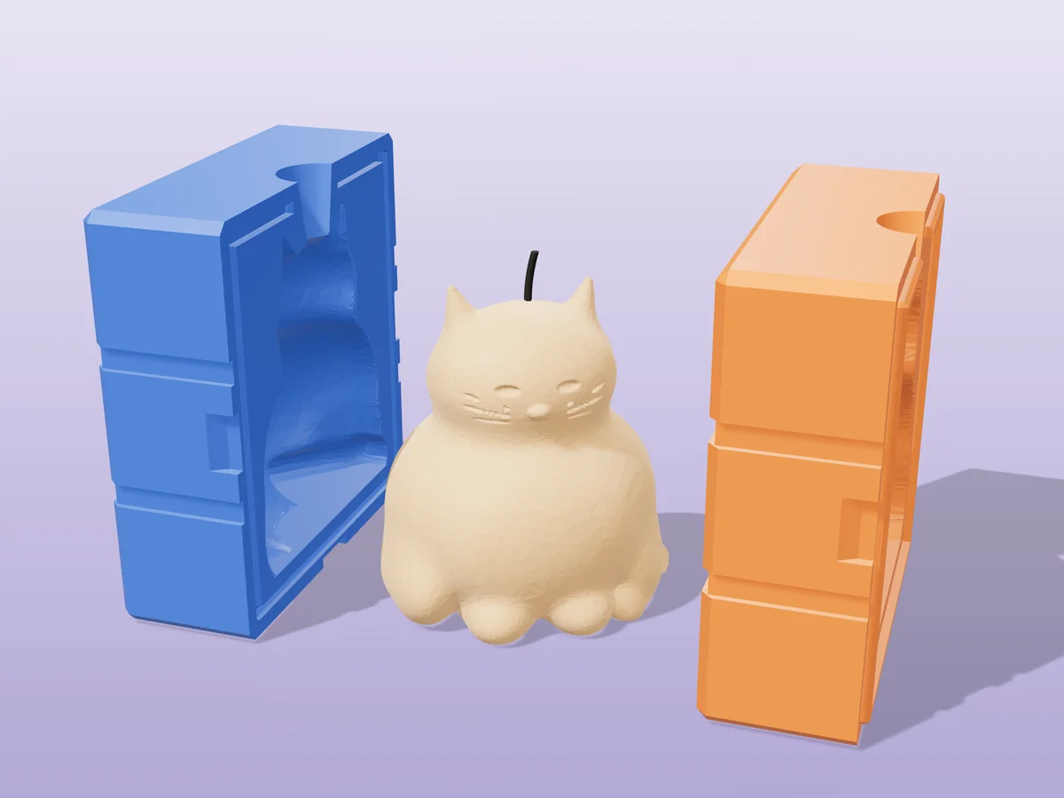 3D render of a cream chonky cat candle with closed eyes and whiskers between the two printed halves of its rigid blue and orange mold
