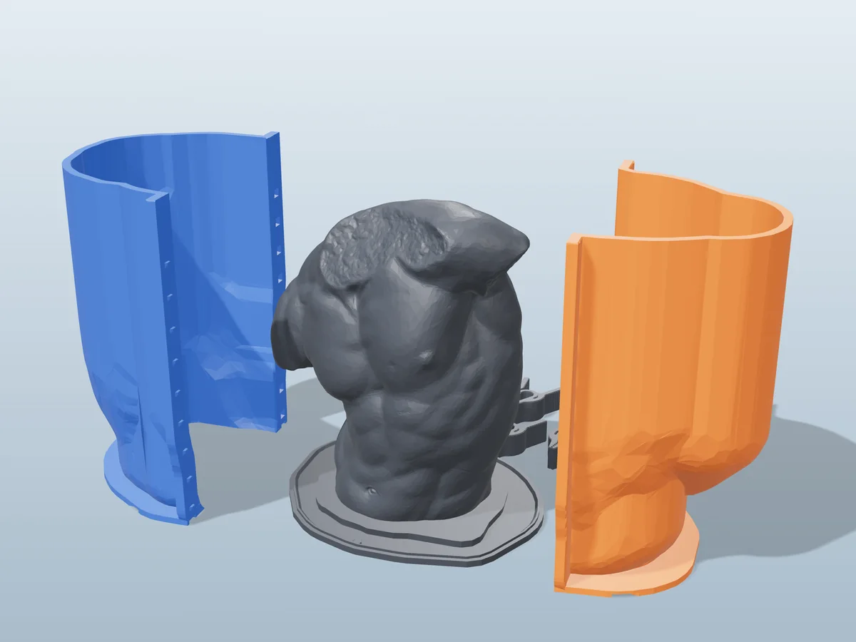 3D render of the classical torso master fused on its printed charcoal base, between the orange and blue hugging shell halves