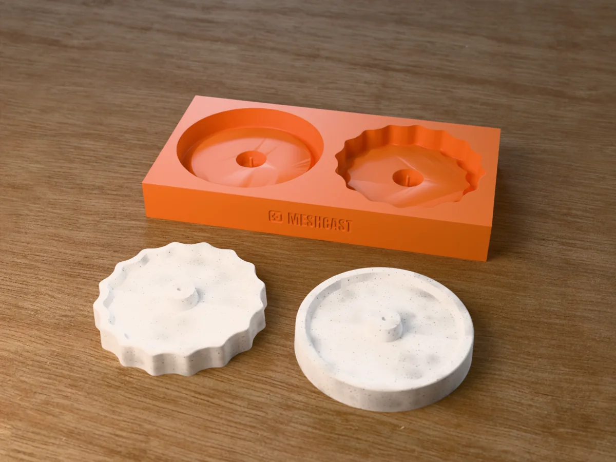 3D render of a printed tray with a round and a gear-edged incense disc cavity, each with a pin for the stick hole, with the two grey concrete incense holders in front