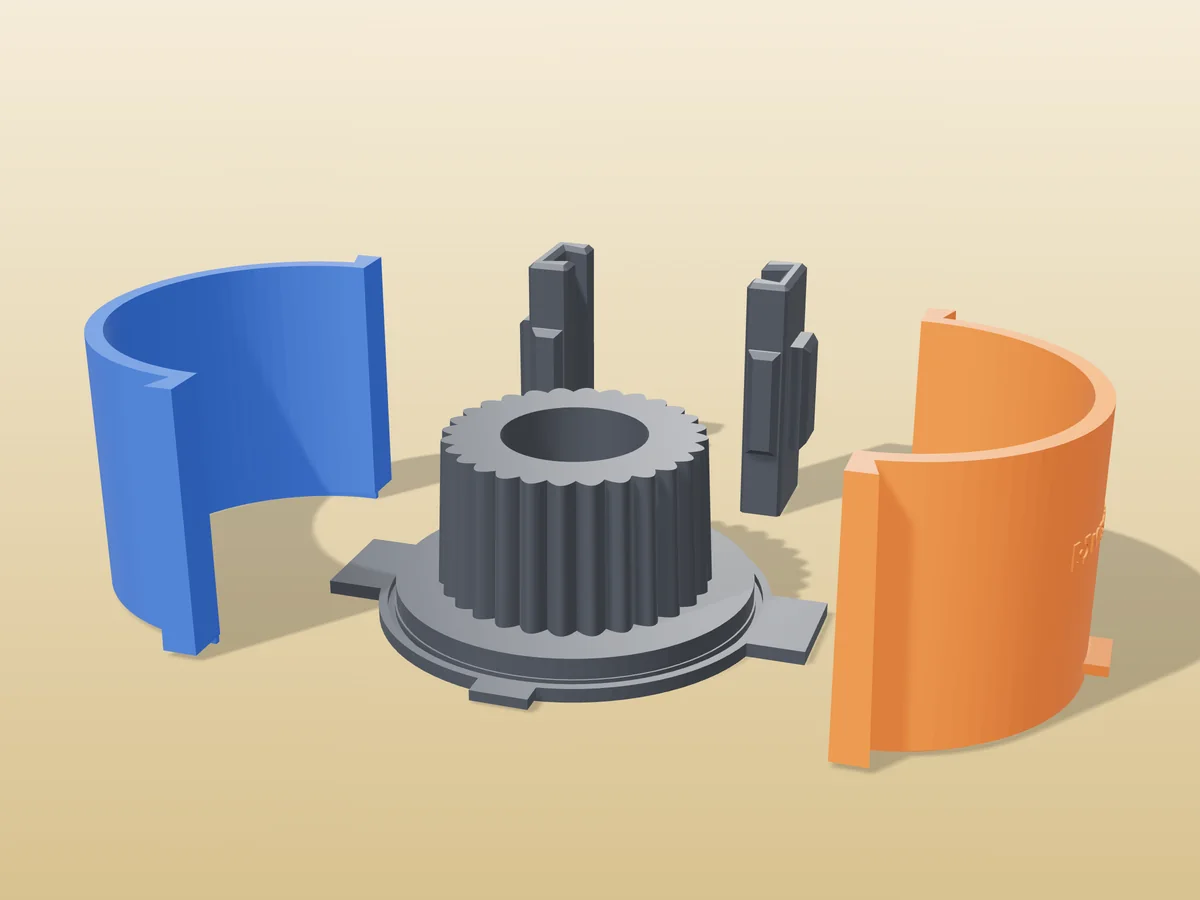 3D render of the fluted tealight holder master fused on its printed charcoal base, between the orange and blue round walls, with the charcoal clamps behind