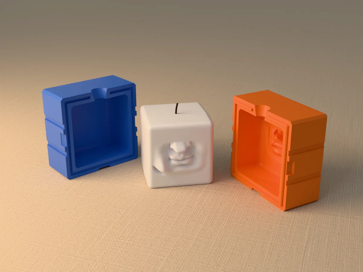 3D render of a white cube candle with the lips of Michelangelo's David in relief, between the two printed halves of its rigid blue and orange mold