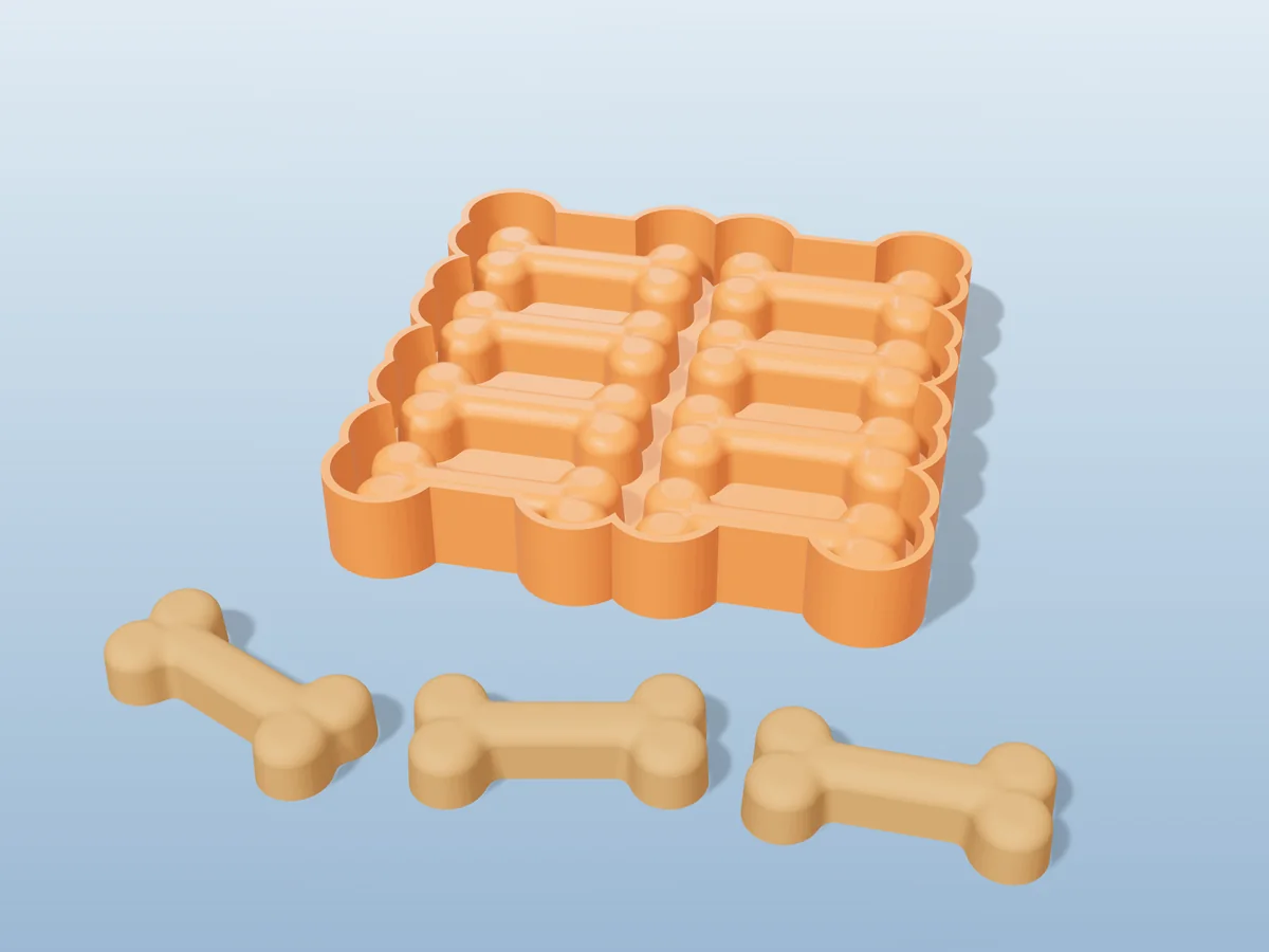 3D render of the printed caster for an eight-bone silicone dog treat tray, with three golden dog bone treats in front
