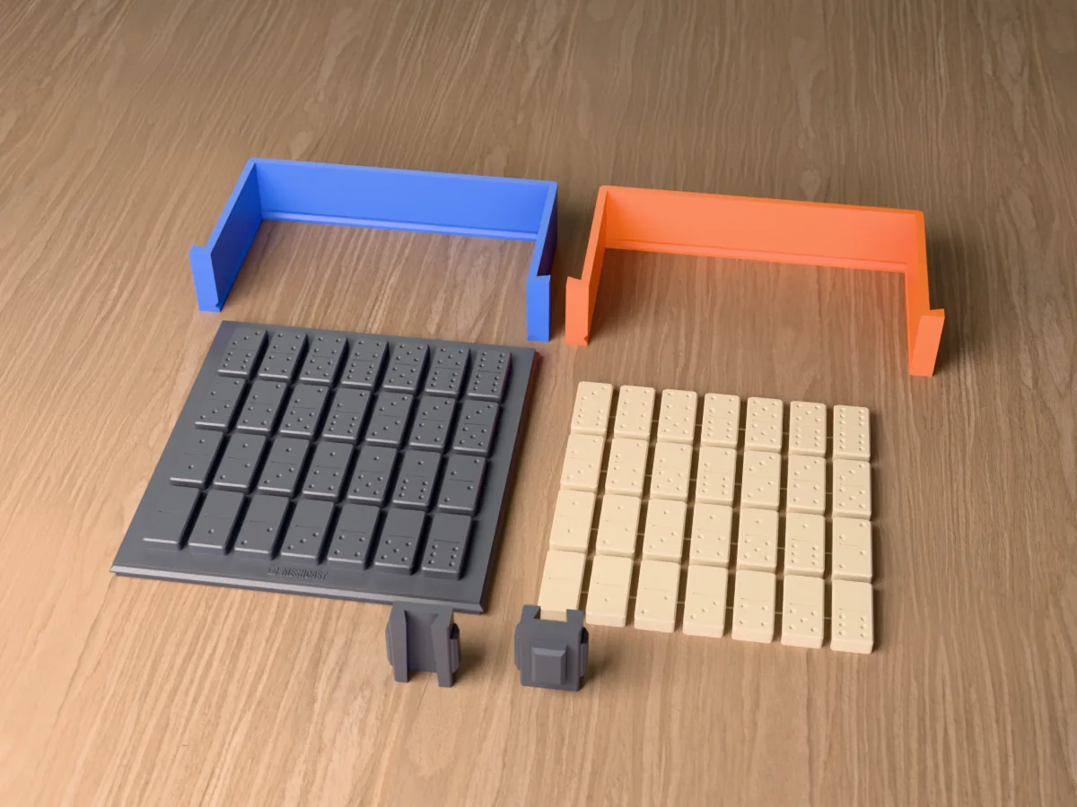 3D render of the printed base with 28 domino tile masters standing face up, the blue and orange walls behind and the clamps in front, with a set of ivory resin domino tiles beside it