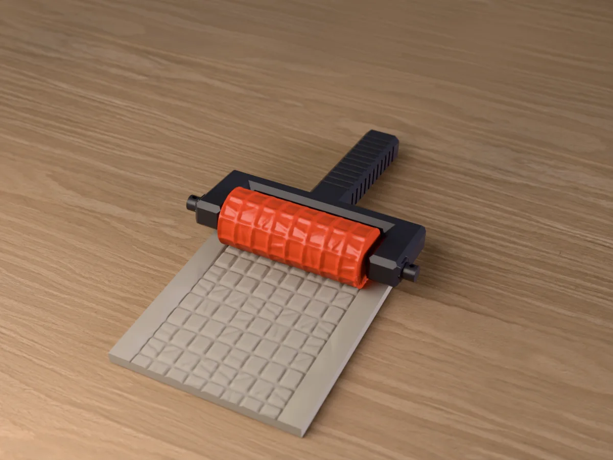 3D render of the printed dungeon floor texture roller in its dark fork handle, resting on a slab of clay it has pressed with square dungeon flagstones