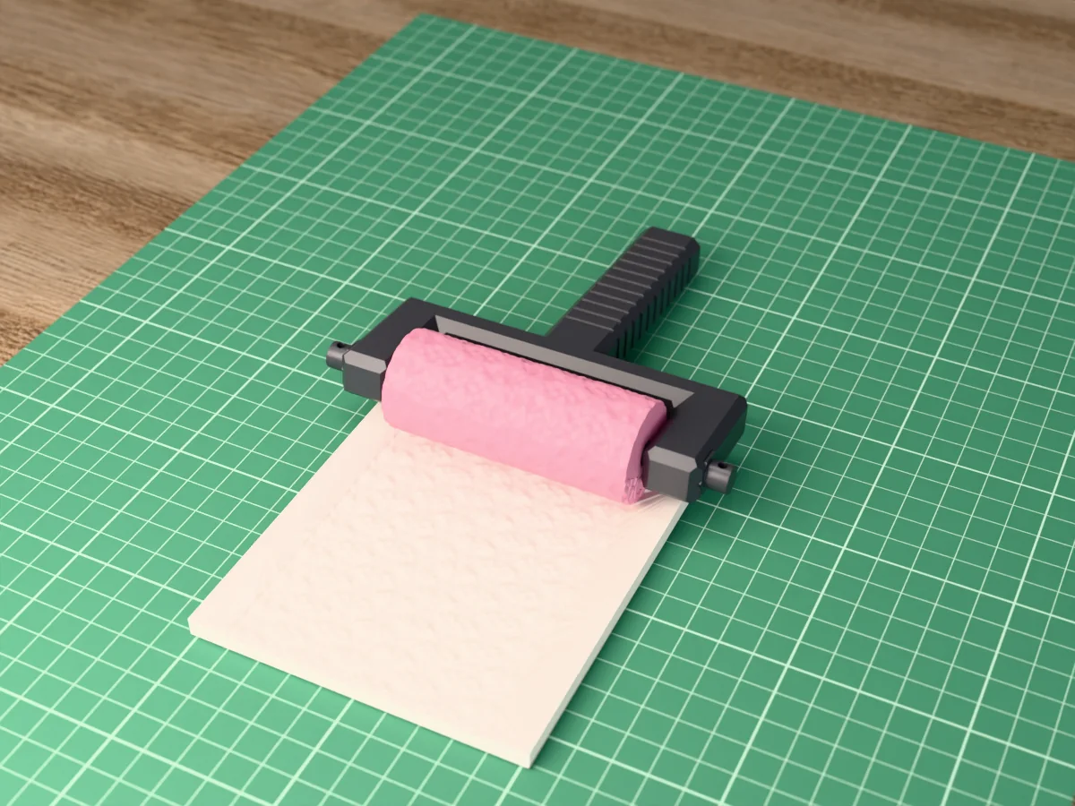 3D render of the printed floral lace texture roller in its dark fork handle, resting on a slab of clay it has pressed with lace rosettes