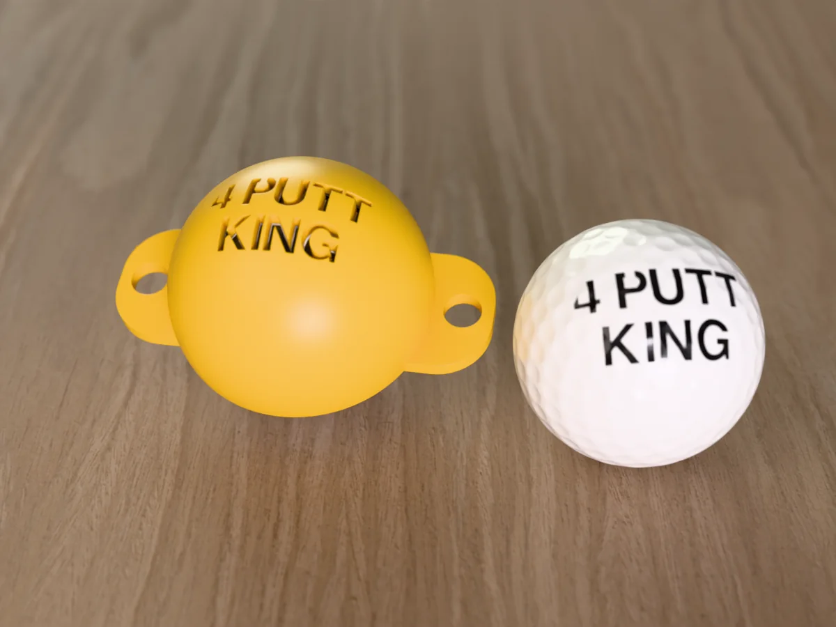 3D render of a gold 3D-printed golf ball stencil with 4 PUTT KING cut through it, sitting on a golf ball, next to a ball marked with 4 PUTT KING in black