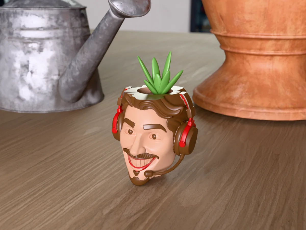 3D render of a 3D-printed head planter of a grinning gamer in a red and black headset with a mic, painted in 6 colours, on a table