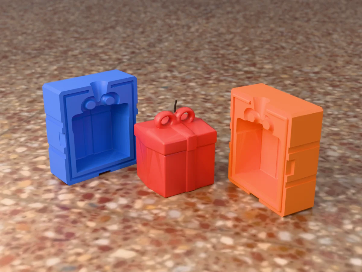 3D render of a red gift box candle with a raised ribbon and a bow on top between the two printed halves of its rigid two-part mold
