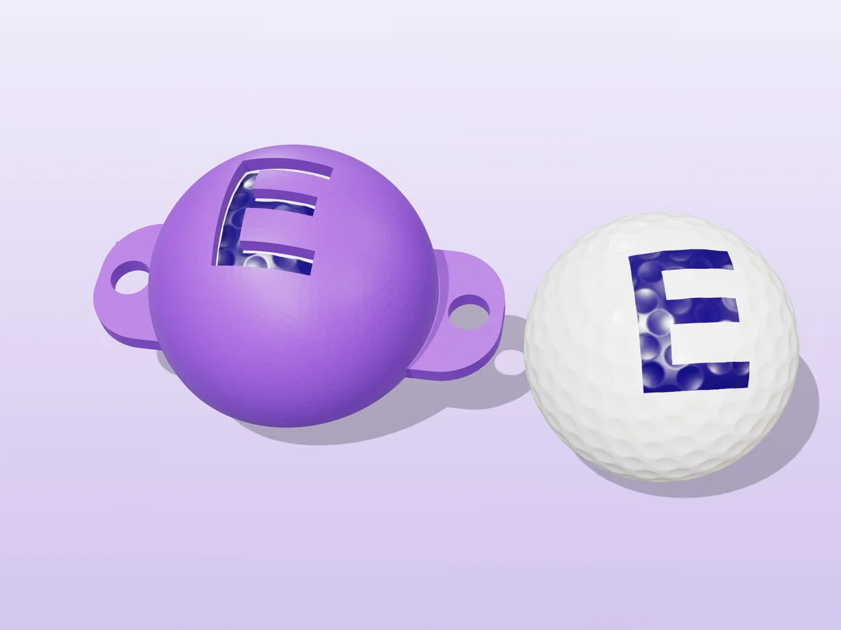 3D render of a purple 3D-printed golf ball stencil with the letter E cut through it, sitting on a golf ball, next to a ball marked with a purple E