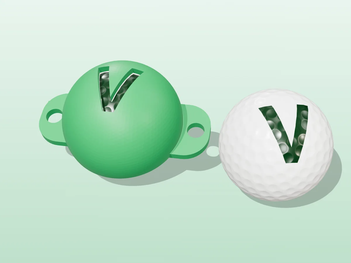 3D render of a green 3D-printed golf ball stencil with the letter V cut through it, sitting on a golf ball, next to a ball marked with a green V