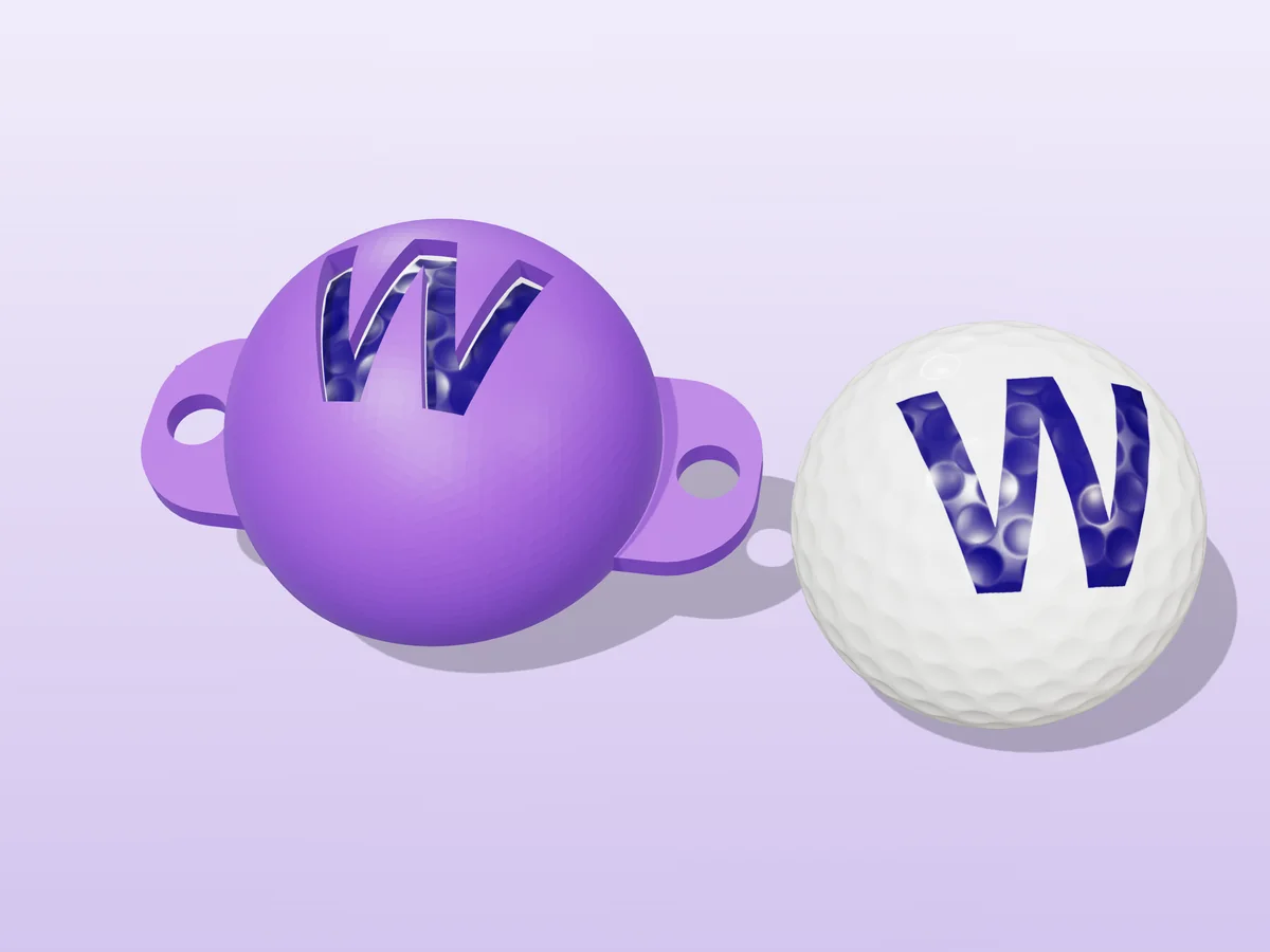 3D render of a purple 3D-printed golf ball stencil with the letter W cut through it, sitting on a golf ball, next to a ball marked with a purple W