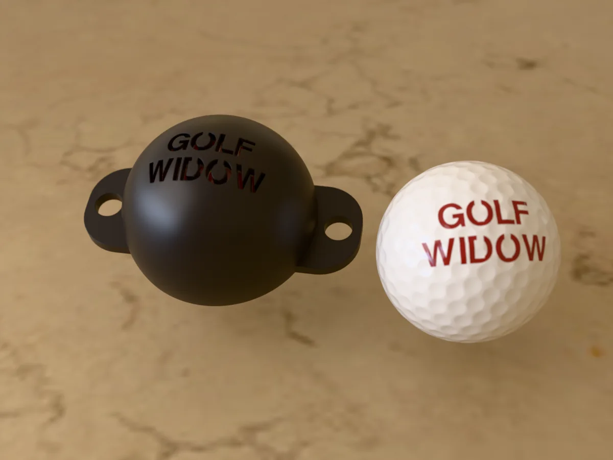 3D render of a black 3D-printed golf ball stencil with GOLF WIDOW cut through it, sitting on a golf ball, next to a ball marked with GOLF WIDOW in red