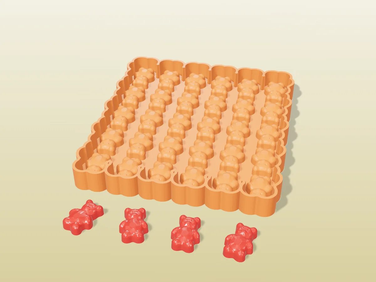3D render of the printed caster for a thirty-bear silicone gummy tray, with a row of red gummy bears in front