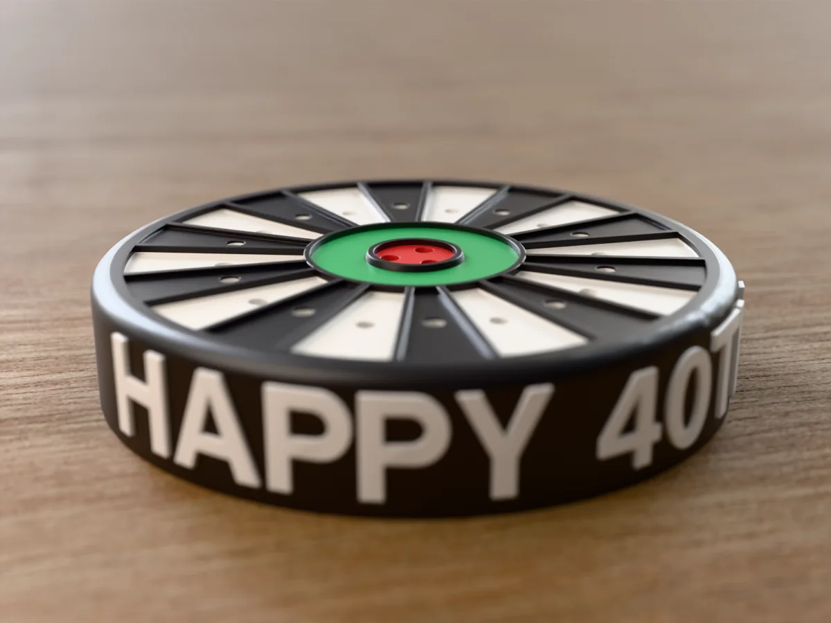 3D render, close view of the empty HAPPY 40TH dart holder, the name in raised white letters round the side of the black case