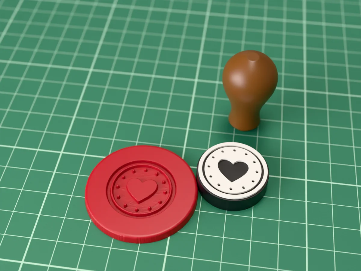 3D render of the printed heart wax seal stamp, face up next to its brown handle, and a round wax seal it has pressed