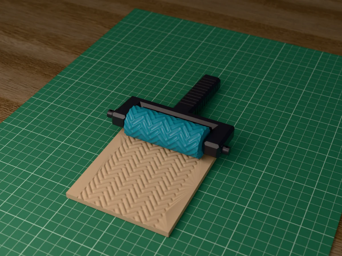 3D render of the printed herringbone texture roller in its dark fork handle, resting on a slab of clay it has pressed with a herringbone