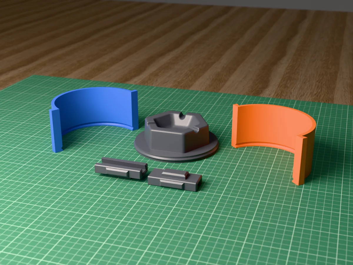 3D render of the hexagon concrete ashtray master with three cigarette rests, fused on its printed charcoal base between the orange and blue round walls, with the charcoal clamps behind
