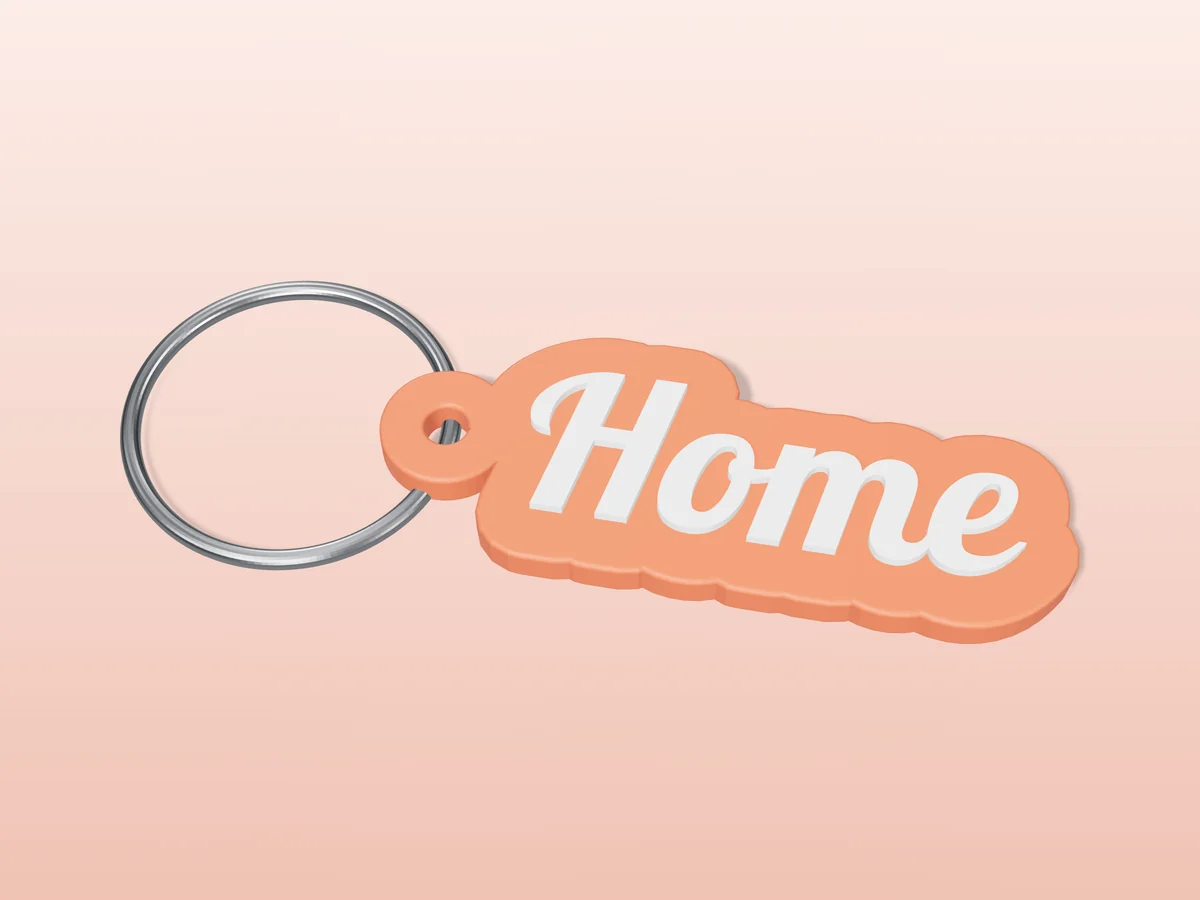 3D render of a coral and white 3D-printed Home keychain with a steel split ring through its hole
