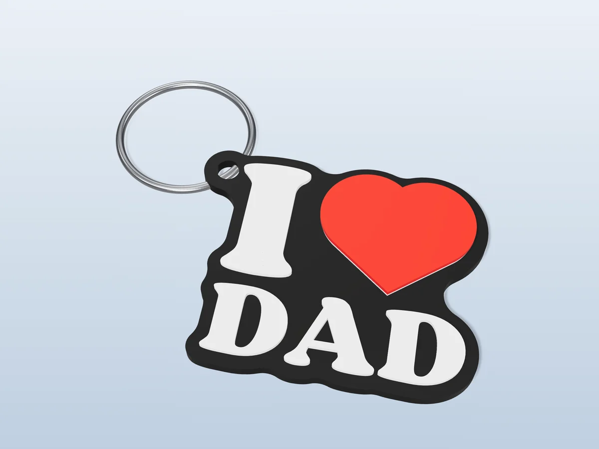 3D render of a black, white and red 3D-printed I love Dad keychain with a steel split ring through its hole