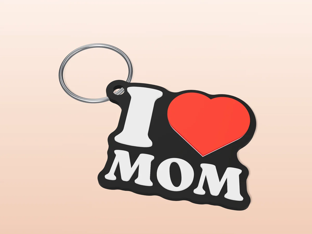 3D render of a black, white and red 3D-printed I love Mom keychain with a steel split ring through its hole