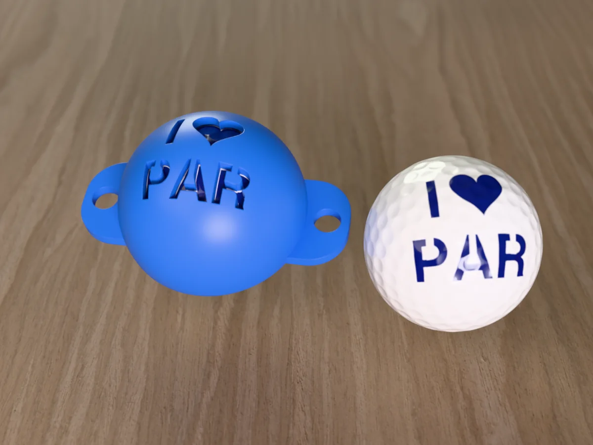 3D render of a blue 3D-printed golf ball stencil with I (heart) PAR cut through it, sitting on a golf ball, next to a ball marked with I (heart) PAR in blue
