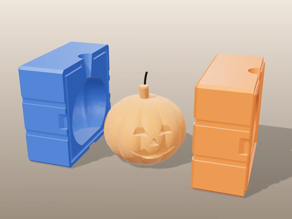 3D render of an orange jack-o-lantern candle with a carved face between the two printed halves of its rigid blue and orange mold