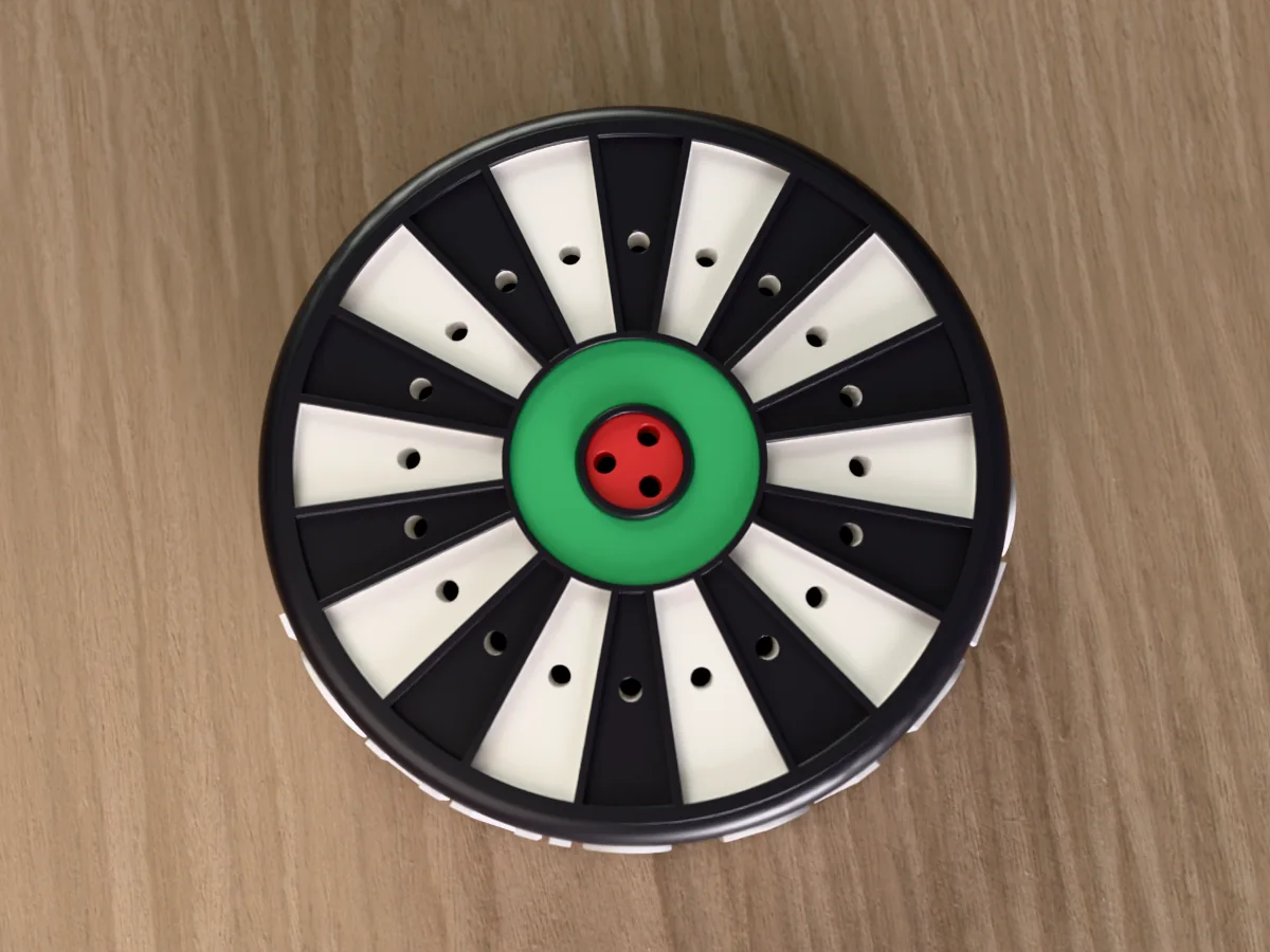 3D render of the JOHN'S DARTS dart holder from straight above: the black and white dartboard face with a hole in every wedge, the green ring and the red bullseye with its three holes