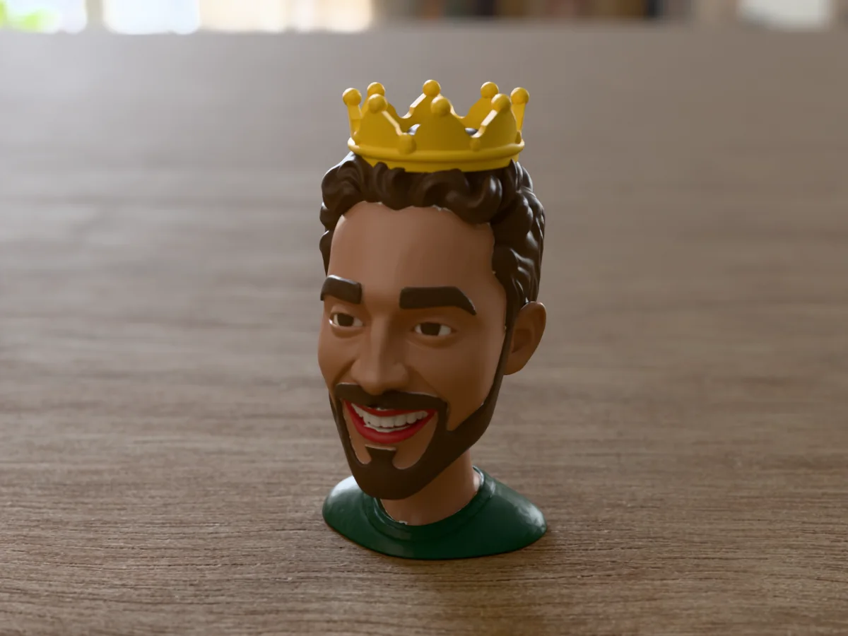 3D render of a 3D-printed king of the desk bust with crown, a cartoon head made with the head generator