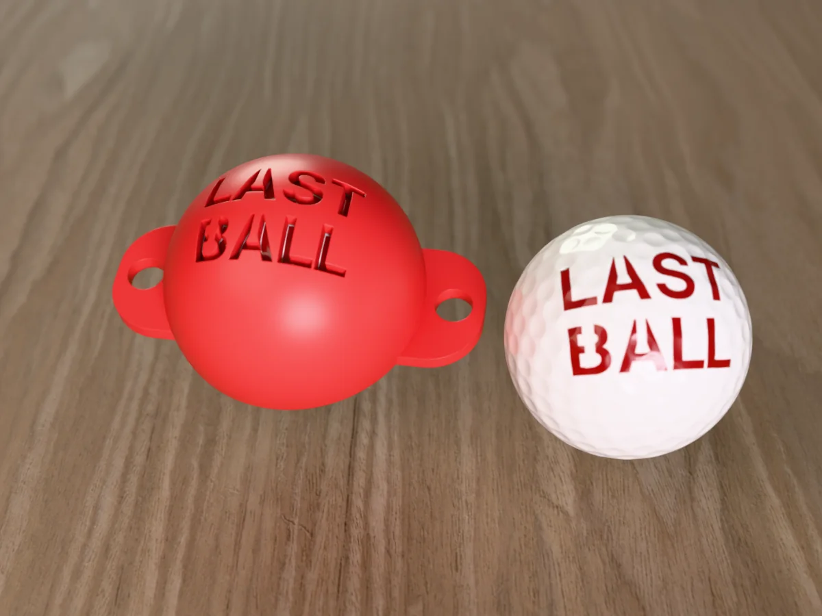 3D render of a red 3D-printed golf ball stencil with LAST BALL cut through it, sitting on a golf ball, next to a ball marked with LAST BALL in red