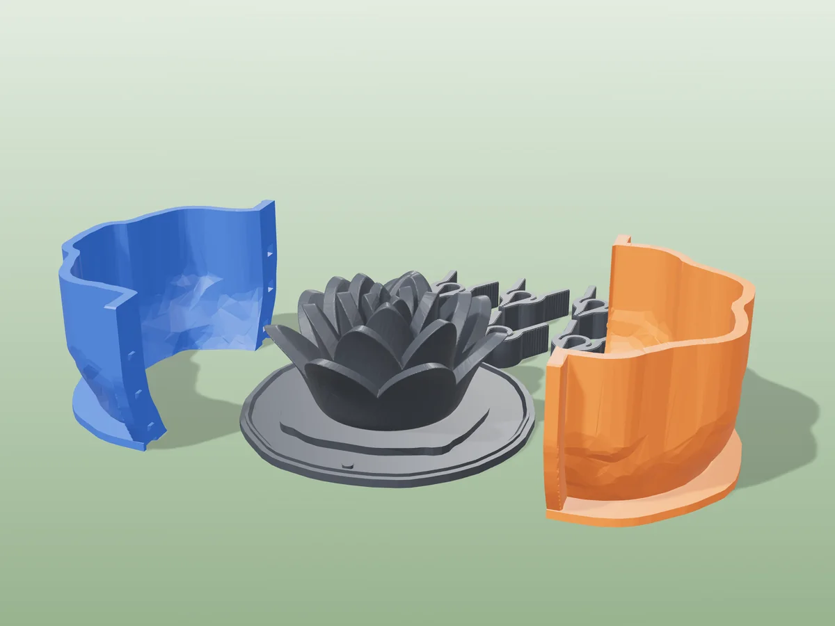 3D render of the lotus flower master fused on its printed charcoal base, between the orange and blue hugging shell halves