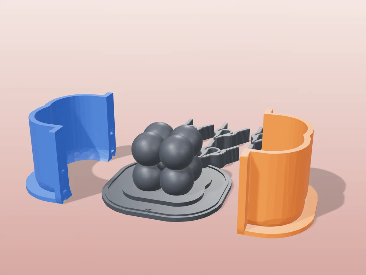 3D render of the mini bubble cube master fused on its printed charcoal base, between the orange and blue hugging shell halves