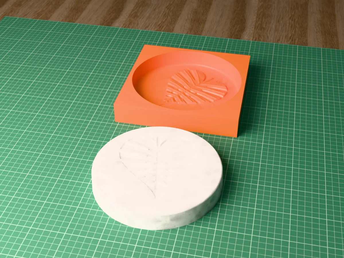 3D render of a printed orange tray for a round stepping stone, with a grey concrete stone with a monstera leaf pressed into its face in front