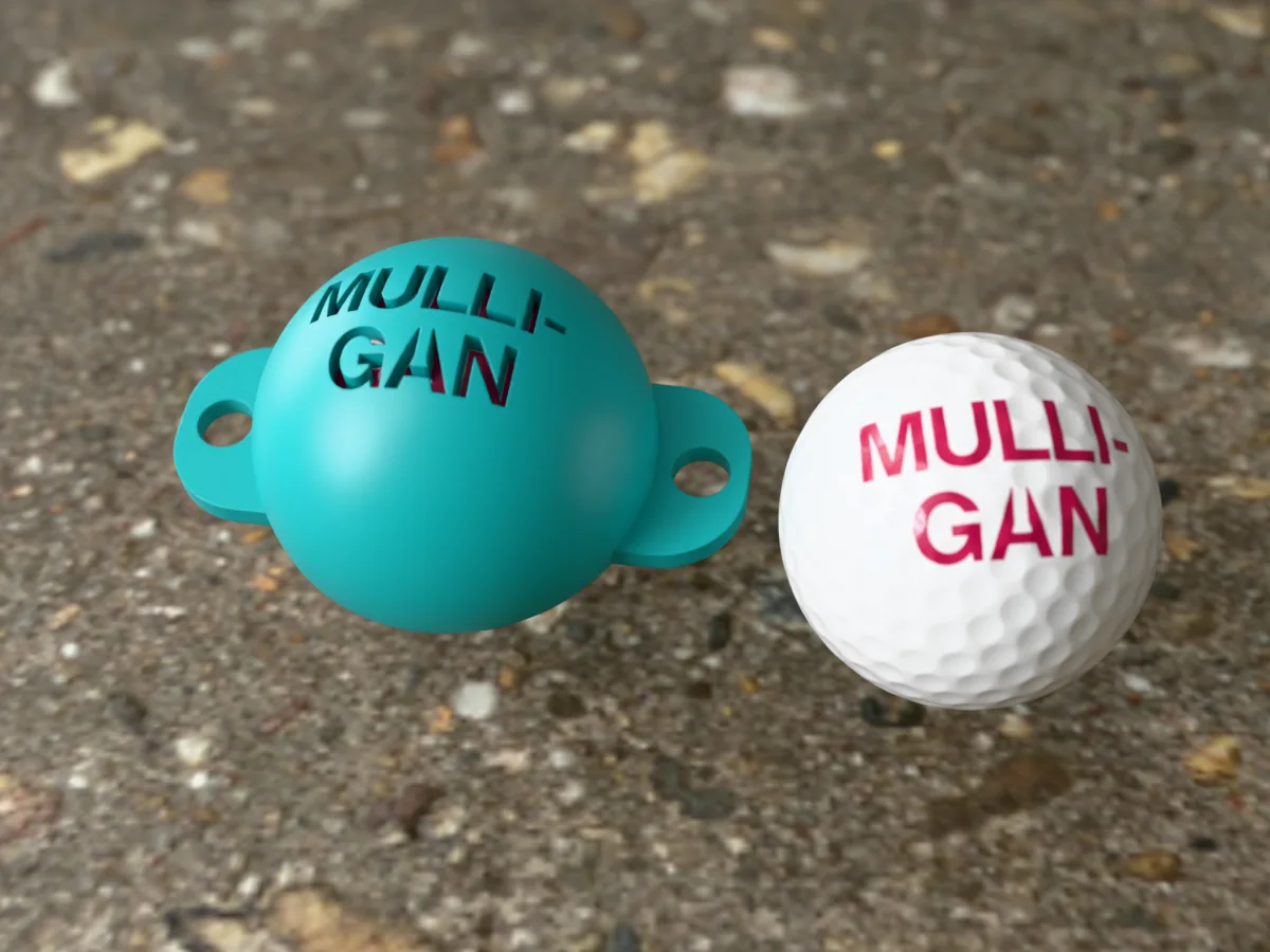 3D render of a teal 3D-printed golf ball stencil with MULLI-GAN cut through it, sitting on a golf ball, next to a ball marked with MULLI-GAN in pink