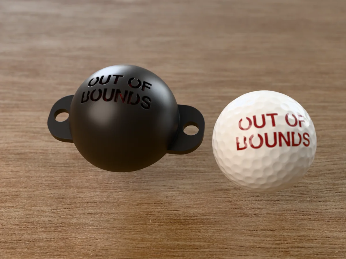 3D render of a black 3D-printed golf ball stencil with OUT OF BOUNDS cut through it, sitting on a golf ball, next to a ball marked with OUT OF BOUNDS in red