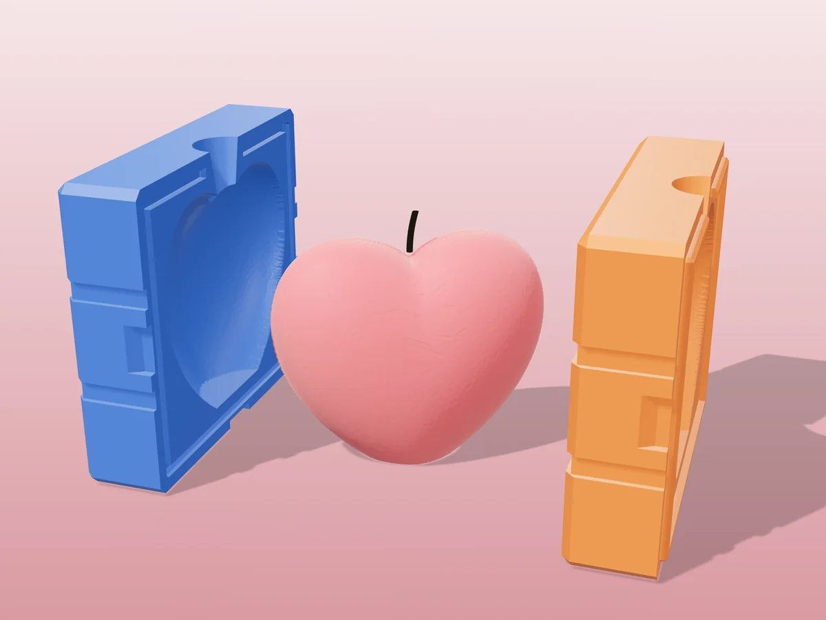 3D render of a red puffy heart candle between the two printed halves of its rigid blue and orange mold