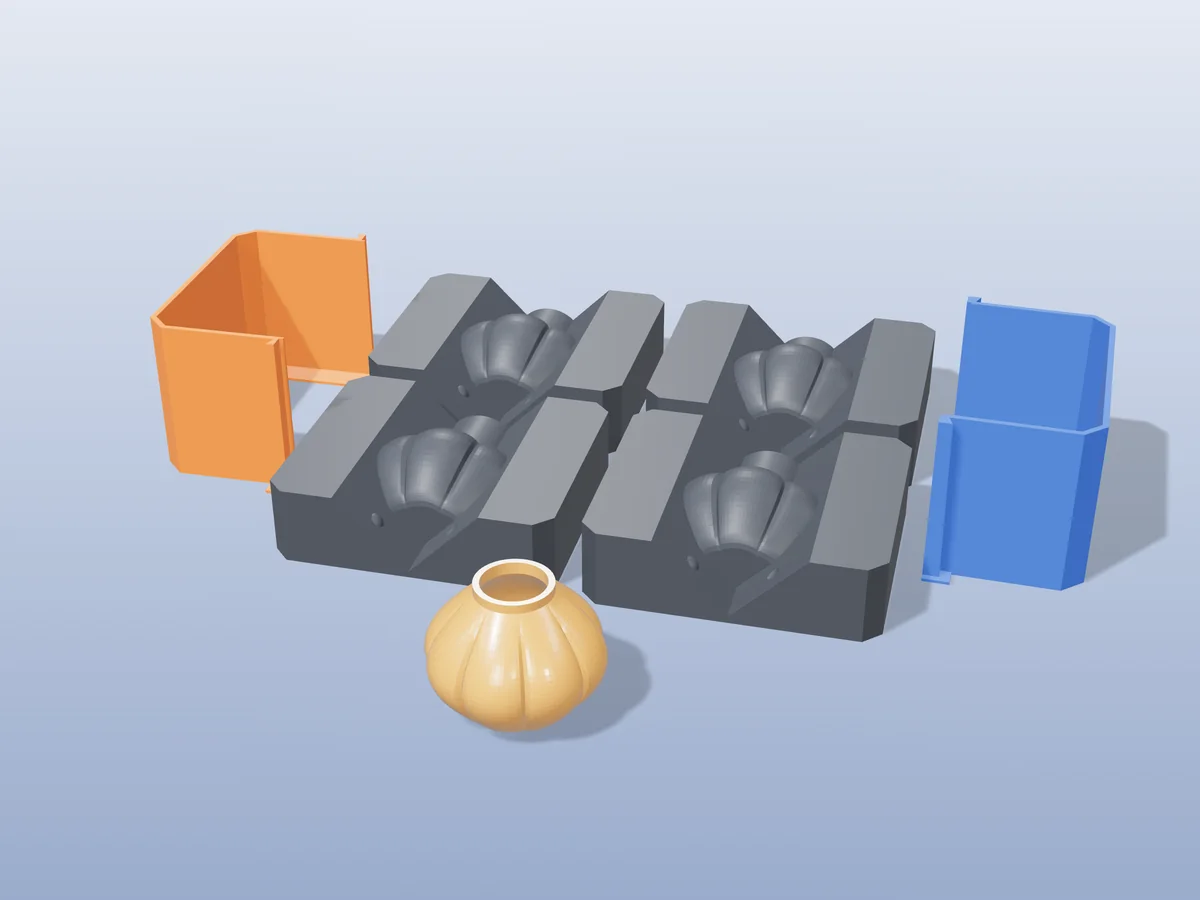 3D render of four printed plaster-mold housings for a pumpkin, orange and blue shells beside charcoal bases, with an orange fired eight-lobed pumpkin in front