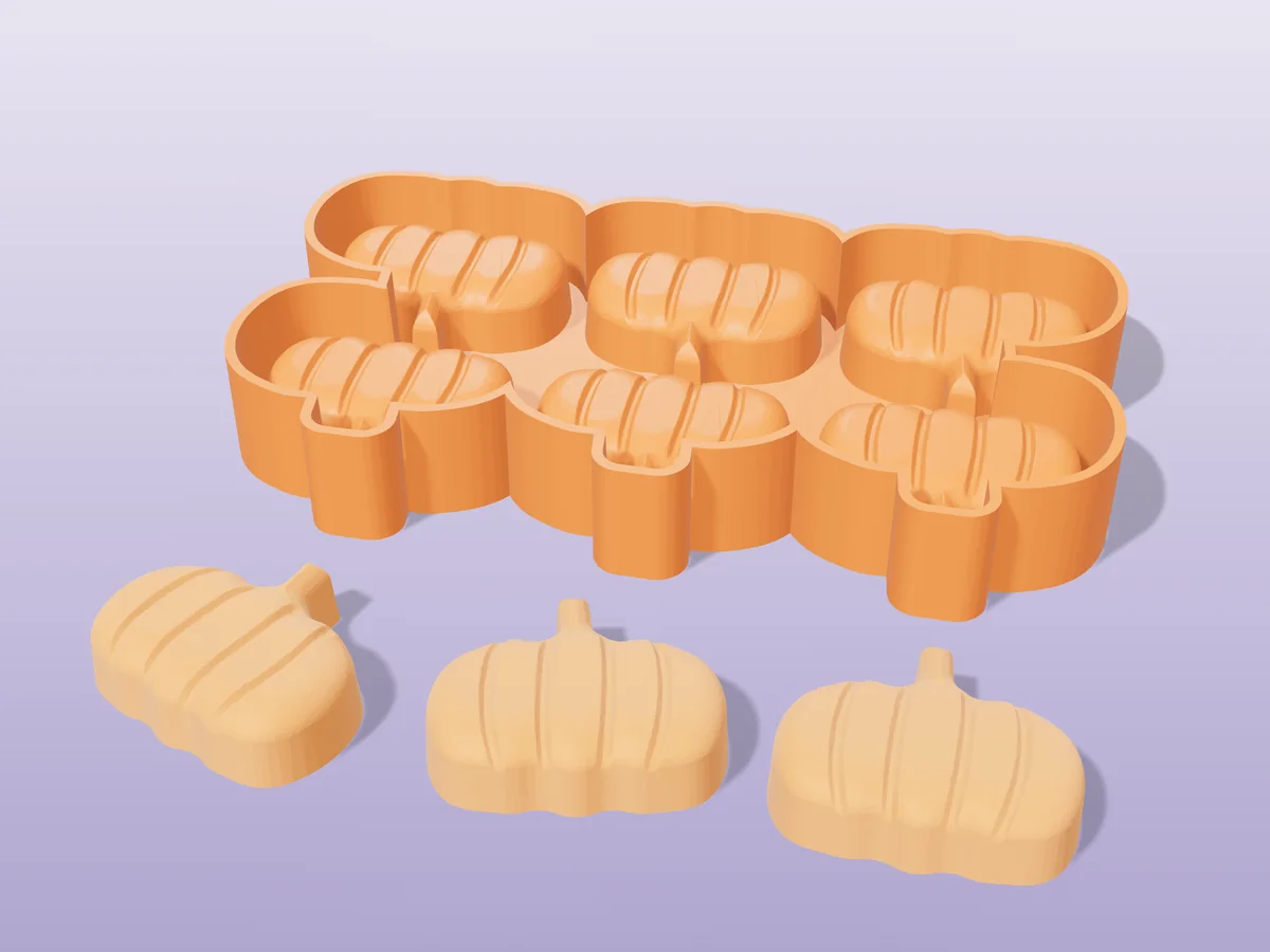 3D render of the printed caster for a six-pumpkin silicone wax melt tray, with three orange pumpkin wax melts in front