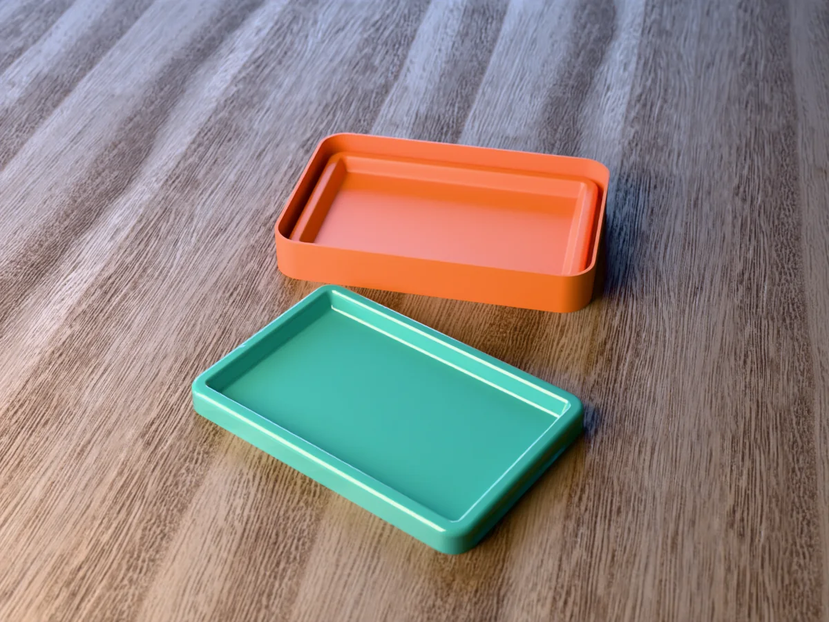 3D render of the printed caster for a resin rolling tray mold, with a glossy teal rectangular resin rolling tray with a rounded lip in front