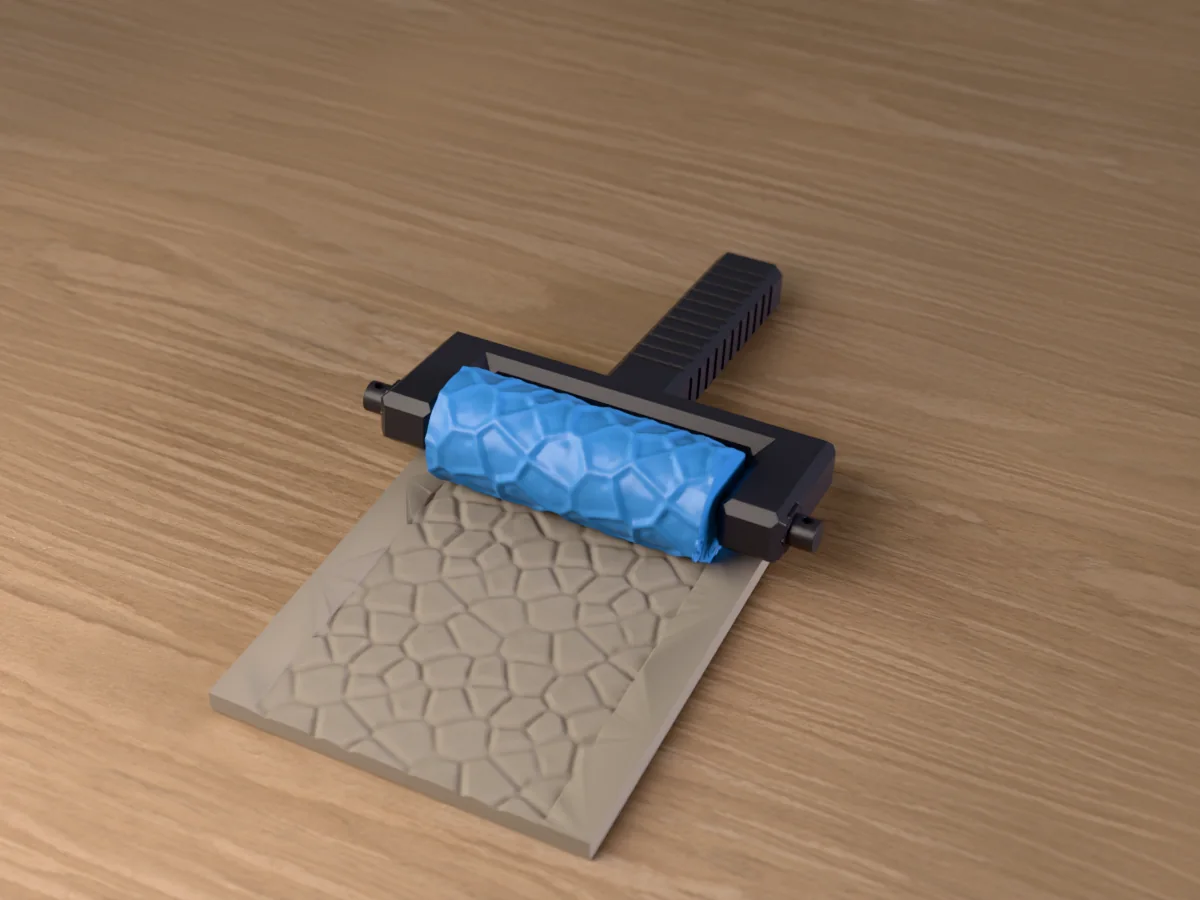 3D render of the printed rock face texture roller in its dark fork handle, resting on a slab of clay it has pressed with a rough rock face